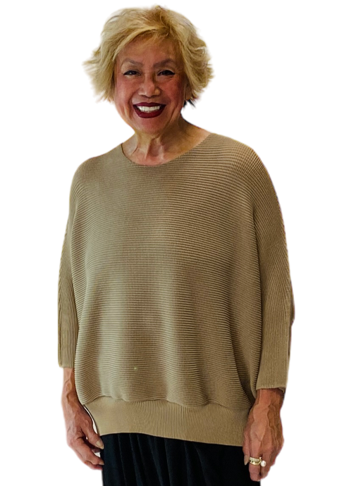 permanent pleat waffle texture camel colored top by vanite couture