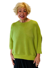 permanent pleat waffle texture green top by vanite couture