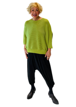 permanent pleat waffle texture green top by vanite couture